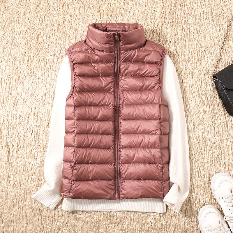 Betty | Ny väst med andfjädrar